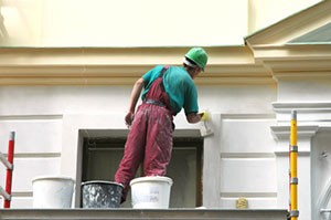 man-painting-house-exterior